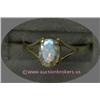 Image 1 : 10 K YELLOW GOLD LADIES GEMSTONE RING SET WITH AN OVAL SHAPED MOONSTONE APPROXIMATELY 6 X 3 MM.  1.5