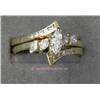 Image 1 : 14 K YELLOW GOLD LADIES TWO-PIECE WEDDING RING SET THAT IS SET WITH A MARQUISE CUT DIAMOND .25 CT AN