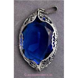 VINTAGE VICTORIAN STYLE PIN/PENDANT SET WITH BLUE GLASS STONE CIRCA 1930.