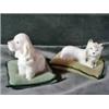 Image 1 : A PAIR OF CANINE PIN CUSHIONS WITH SMALL TERRIER DOGS SITTING ATOP GREEN VELVET PILLOWS. 3" HIGH