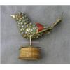 Image 1 : STERLING SILVER FIGURAL BIRD SCULPTURE DECORATED WITH TURQUOISE AND CORAL STONES AND SITTING ON A WO