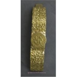 14 K YELLOW GOLD CUSTOM DESIGNED NUGGET STYLE BRACELET SIGNED "ARI". 128.7 GRAMS.