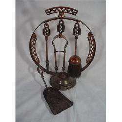 ANTIQUE ENGLISH FIREPLACE SET IN BRONZE WITH COPPER FINISH. 15" X 11".