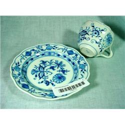 MEISSEN ONION PATTERN CUP AND SAUCER WITH OLD MAKERS MARK.