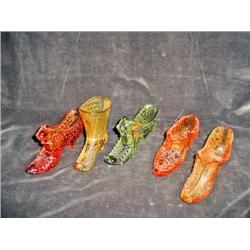 SET OF FIVE FENTON PATTERN GLASS ANTIQUE SHOES IN VARIOUS SHAPES, COLORS, AND SIZES FROM 3.5" X 5".