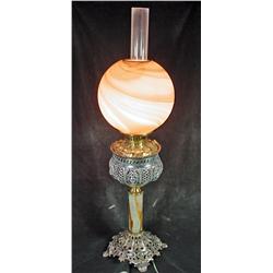 BRADLEY HUBBARD LAMP WITH HANDPAINTED CARAMEL SWIRL GLASS GLOBE WITH A MARBLE AND BRONZE BASE, AND G
