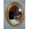 Image 1 : ANTIQUE OVAL MIRROR WITH ORNATE STATION DECORATION. 25" X 18"