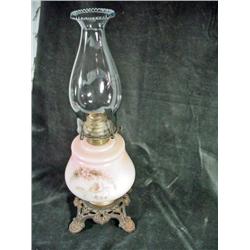ANTIQUE OIL LAMP ON BRASS FOOTED BASE WITH HANDPAINTED MILKGLASS INSERT. HURRICANE SHADE INCLUDED. 1