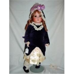1978 REPRODUCTION A&T DOLL, BISQUE, HUMAN HAIR, BLUE VELVET DRESS ON STAND 24".