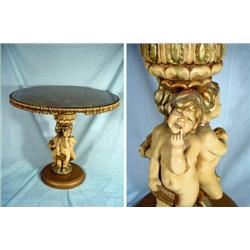 THREE CHERUB ROUND SIDE TABLE. 22" X 24" CHALKWARE FIGURINES ON 11.5" BASE.