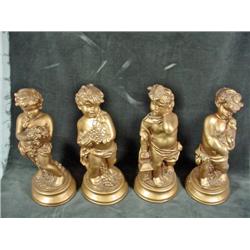 COLLECTION OF FOUR CHALKWARE CHERUBS BY UNIVERSAL STATUARY IN A GOLD FINISH, SIGNED "COREY" CIRCA 19