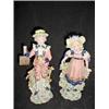 Image 1 : PORCELAIN PAIR OF FIGURINES, BOY AND GIRL WITH "G" MAKERS MARK ON SIDE. 20" TALL
