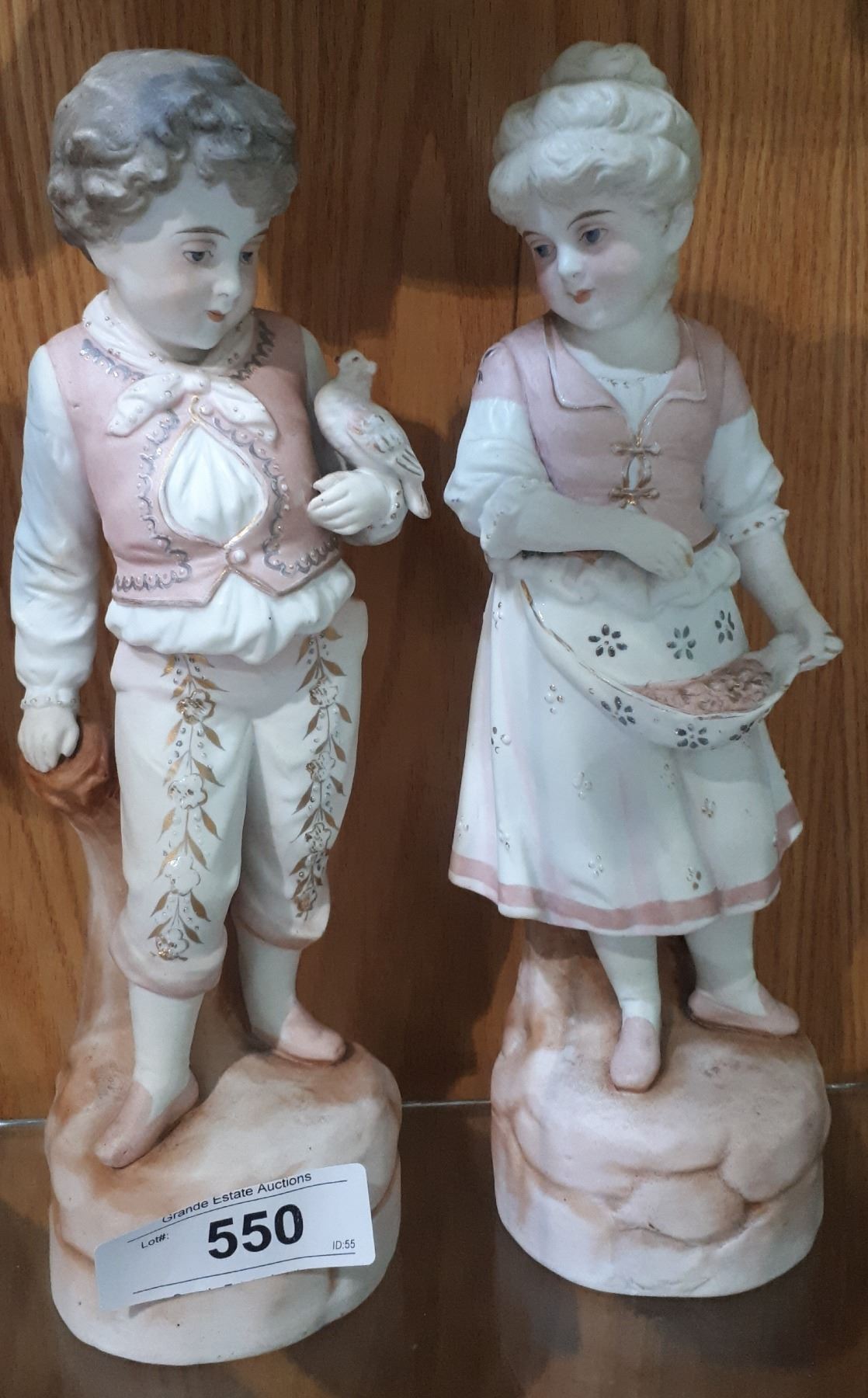 PAIR OF ANTIQUE GERMAN PORCELAIN FIGURINES