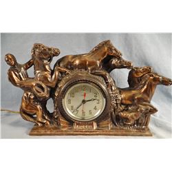 Brass Rodeo cowboy w/5 horses and calf elec clock, 10" h x 17" w
