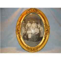 Antique oval picture frame with curved glass, 13" h x 19" w