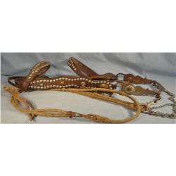 Studded bridle with Buermann bit, rawhide bosal and reins