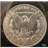 Image 2 : 1884 CC Morgan dollar in GSA folder