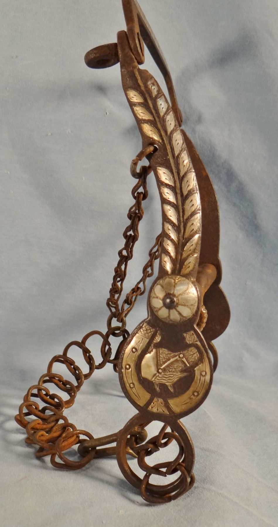 Silver inlaid bit with horseshoe and horsehead