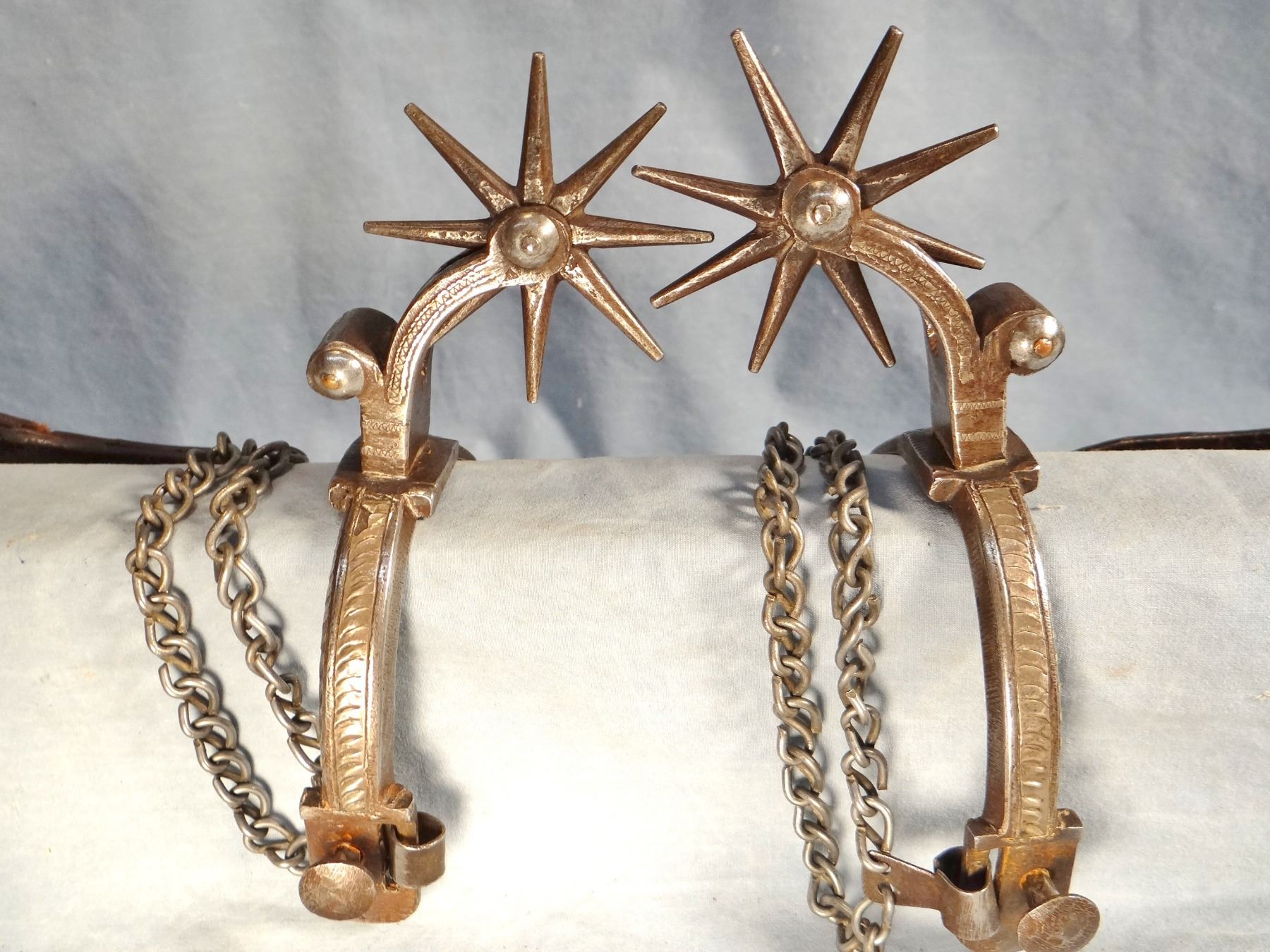 Double mounted California style spurs, 8 pt. rowels