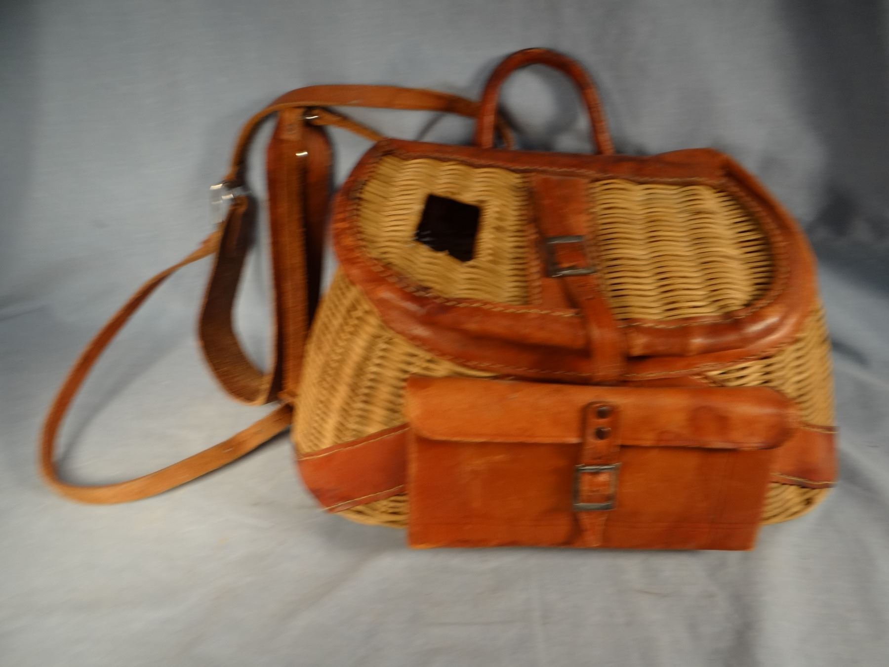 2 older fishing creels w/original shoulder harness and 1920's fly