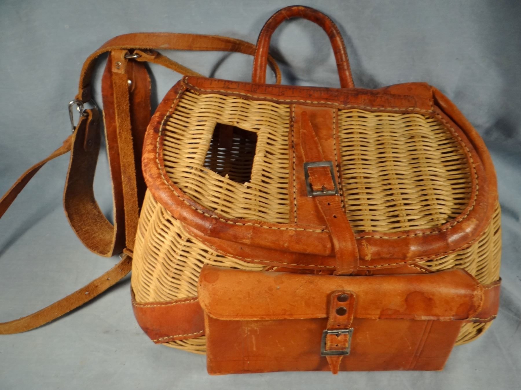 2 older fishing creels w/original shoulder harness and 1920's fly