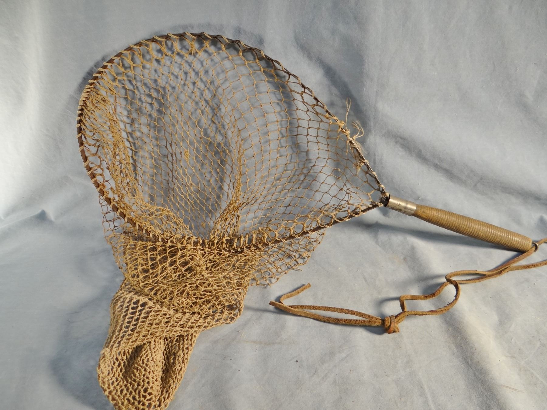 2 older fishing creels w/original shoulder harness and 1920's fly