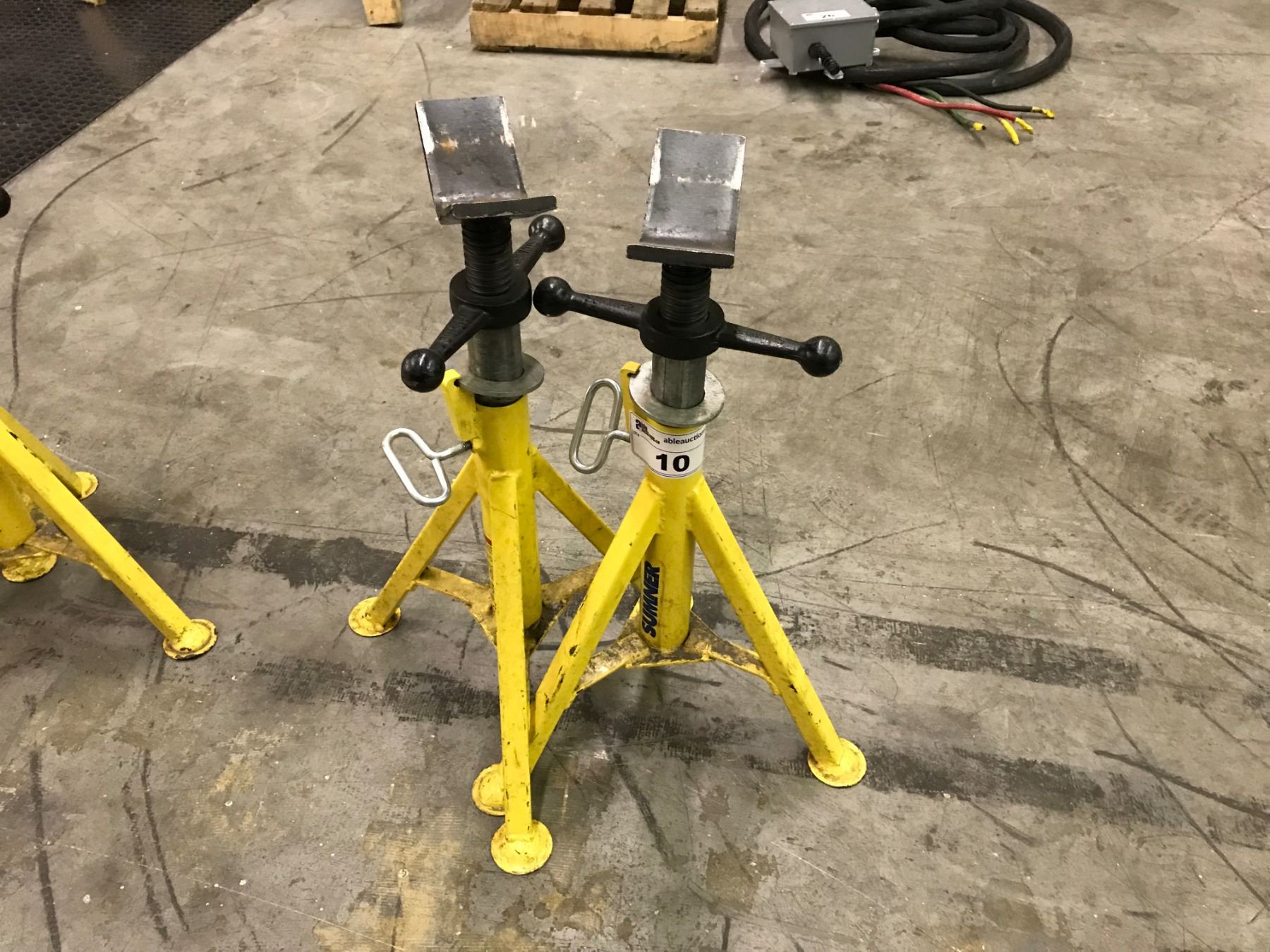 Sumner Pipe Rack PAIR OF SUMNER PIPE STANDS - Able Auctions