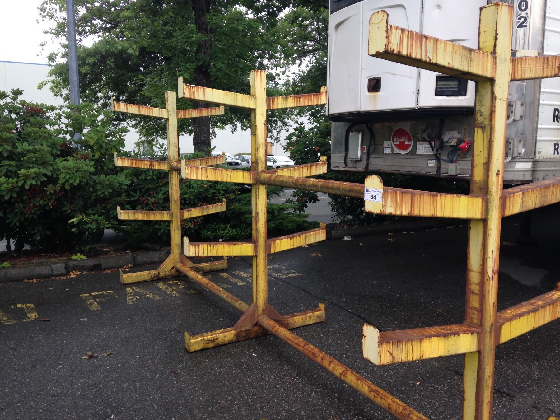 YELLOW HEAVY DUTY 4 TIER STOCK RACK - Able Auctions