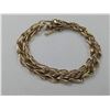 Image 1 : 14K YELLOW GOLD CHARM BRACELET (7")