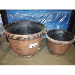 PAIR OF DECORATIVE PLANTERS