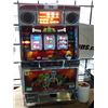 Image 1 : TAKASAGO MONSTER THEMED TABLE-TOP SLOT MACHINE WITH TUB OF TOKENS