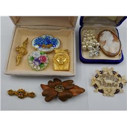 2 BOXES OF ASSORTED BROOCHES