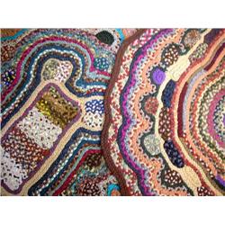 TWO ELLIPTICAL RAG RUGS