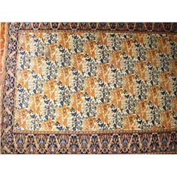 AN ORIENTAL STYLE RUG