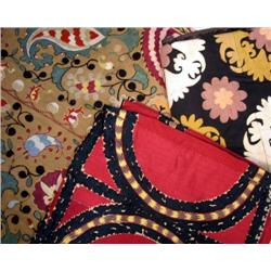 THREE MEDIUM SIZED POLYCHROME NEEDLEWORK PANELS