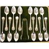 Image 1 : A GROUP OF TWELVE SILVER-PLATED COFFEE SPOONS AND A PAIR OF SUGAR TONGS