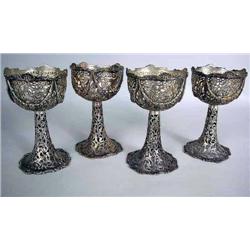 TWELVE STERLING SILVER RETICULATED FOOTED GOBLETS