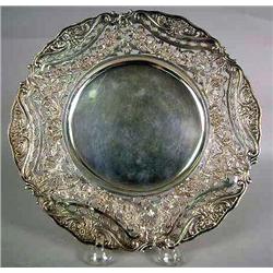 AN ASSEMBLED SET OF PIERCED SILVER PLATES COMPRISING: Five 800 German plates and three Sterling Silv