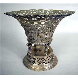 A SILVER PLATED RETICULATED FOOTED COMPOTE ON BASE