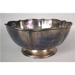 A HAND WROUGHT STERLING SILVER SCALLOPED FOOTED BOWL