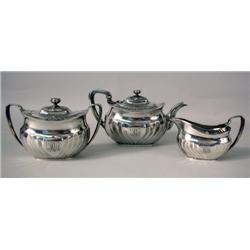 A TIFFANY & CO MAKERS STERLING SILVER THREE-PIECE TEA SERVICE