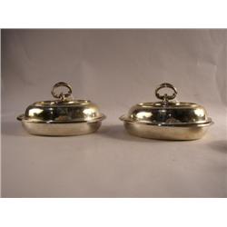 A PAIR OF TIFFANY & CO. MAKERS SILVER SOLDERED OVAL COVERED VEGETABLE DISHES
