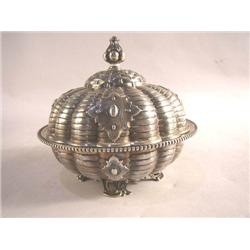 A TIFFANY & CO. 550 BROADWAY, NEW YORK COIN SILVER CIRCULAR COVERED BUTTERBALL WITH LINER