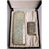 Image 1 : A STERLING 950 SILVER CIGARETTE CASE AND LIGHTER SET