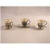 Image 1 : A SET OF TWELVE LENOX DEMITASSE LINERS AND STERLING SILVER HOLDERS