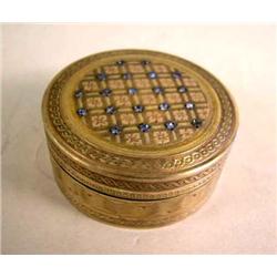 A FRENCH GILT SILVER CIRCULAR COSMETIC BOX