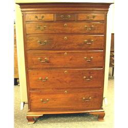 A CHIPPENDALE WALNUT TALL CHEST OF DRAWERS