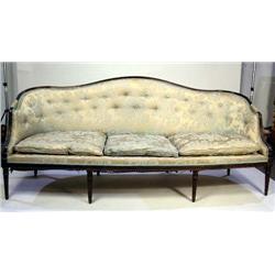 A GEORGE III STYLE CARVED MAHOGANY CAMELBACK SOFA