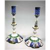 Image 1 : A PAIR OF ROCOCO POLYCHROME-DECORATED BATTERSEA OR SOUTH STAFFORDSHIRE CANDLESTICKS
