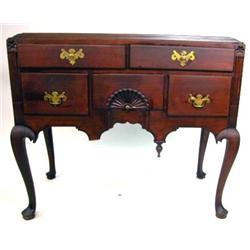A QUEEN ANNE CARVED CHERRYWOOD DRESSING TABLE